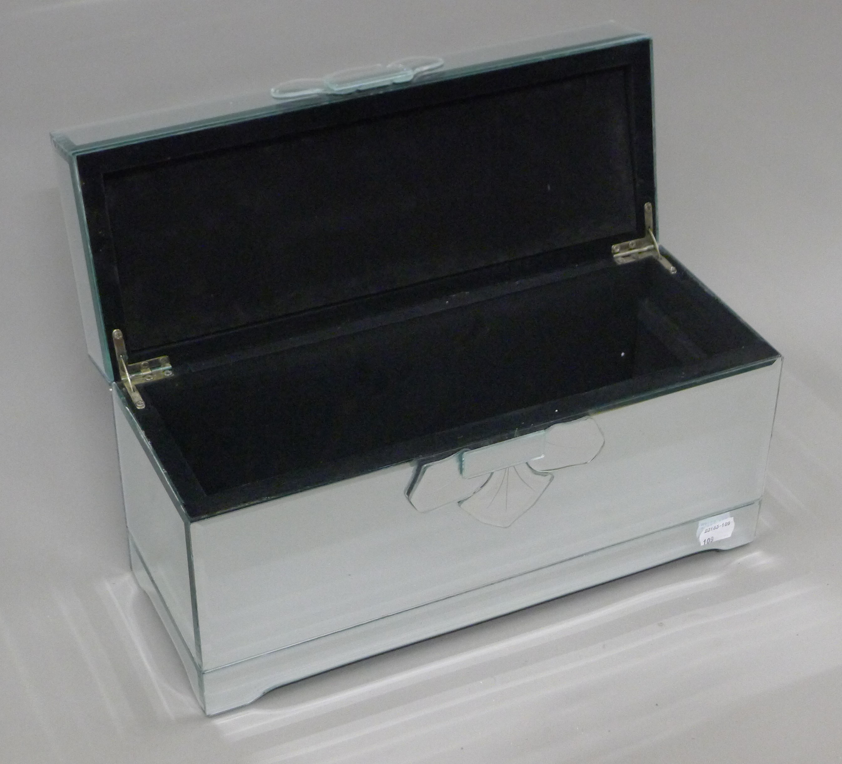 A mirrored jewellery casket. 37.5 cm wide. - Image 2 of 3
