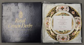 A boxed Royal Crown Derby 1997 Christmas plate.