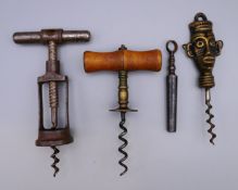 Four various corkscrews. Largest 17 cm high.