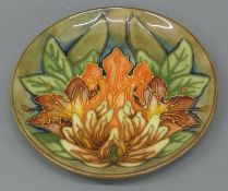 A Moorcroft Flames of the Forest dish. 15.5 cm diameter.