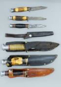 Six various hunting knives, including antler handled examples.
