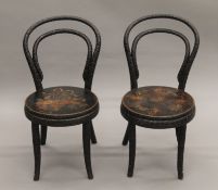 A pair of late 19th century bentwood and pokerwork child's chairs. 63.5 cm high.