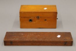 A vintage Magneto-Electric machine and a cased boxwood rule. The former 25 cm long.