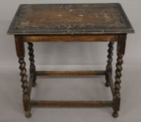A Victorian carved oak barley twist side table. 75 cm long.