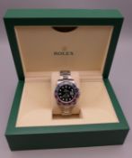 An unworn 2022 Rolex GMT Master II watch model number 126710BLRO in its original box and packaging