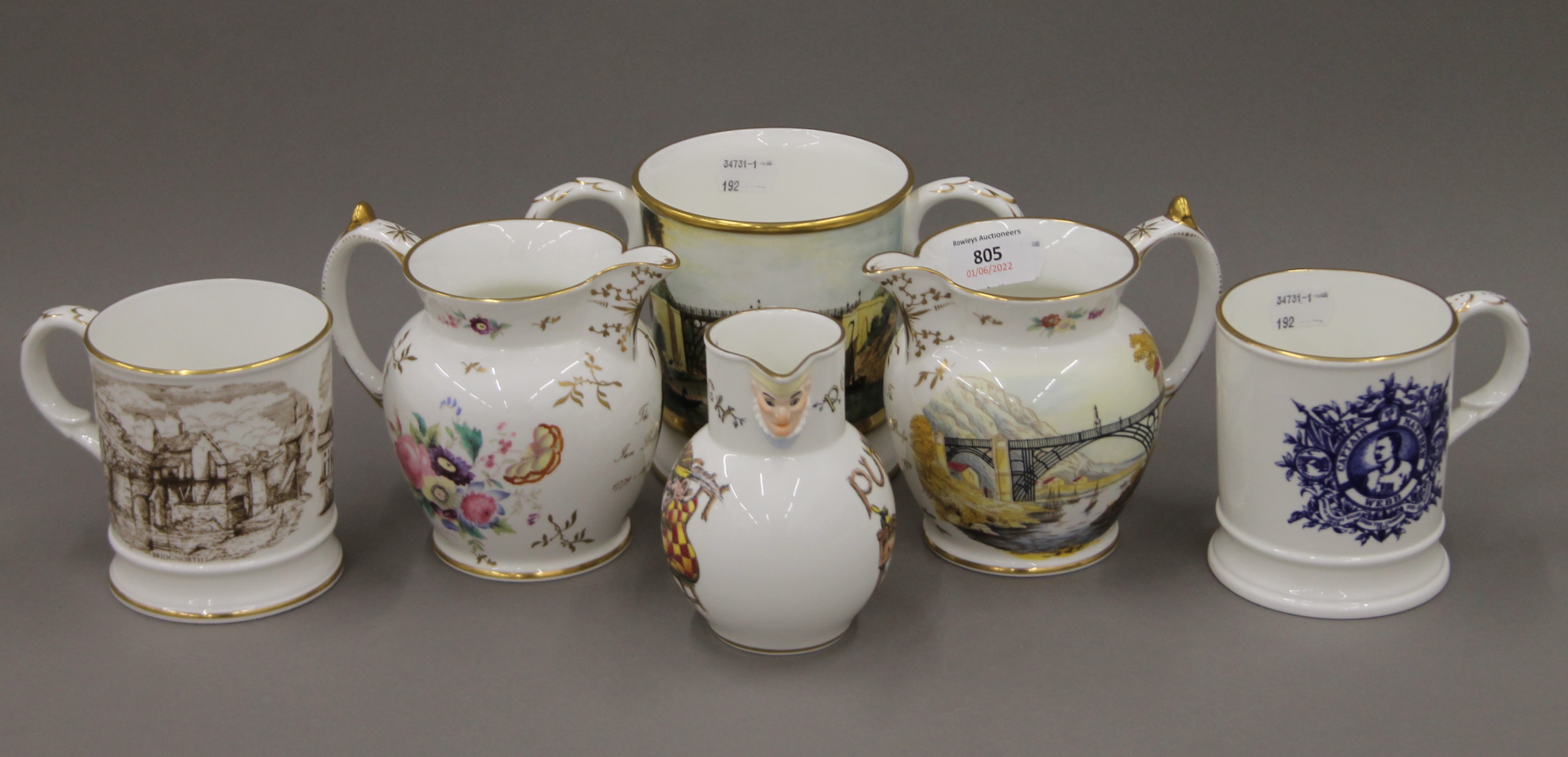 A small collection of Coalport jugs and mugs. The largest 12.5 cm high.