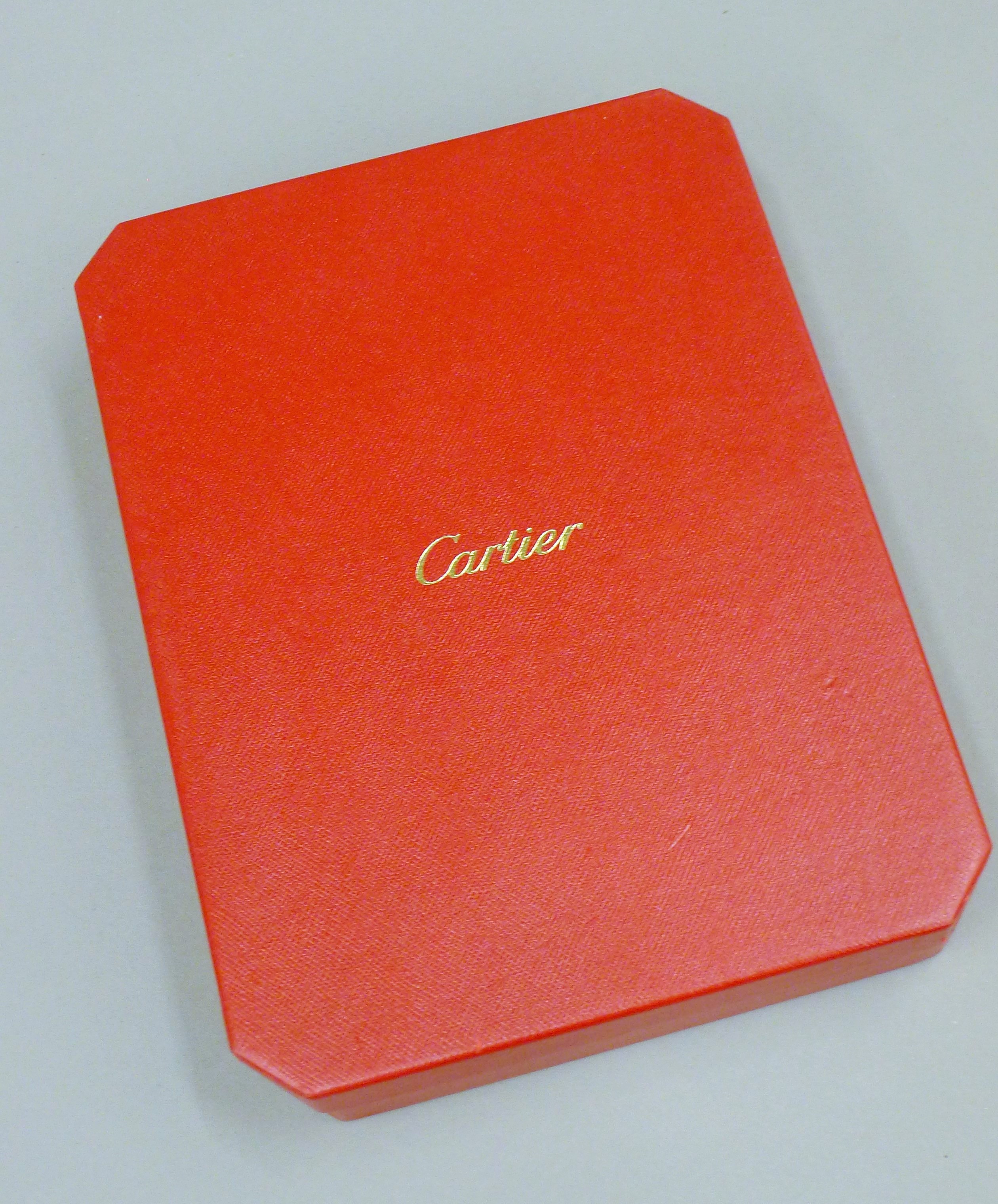 A Cartier watch user guide booklet in box.