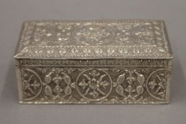 An Indo-Persian white metal hinged box. 10 cm wide. 145 grammes.