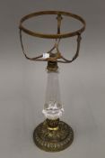 A Victorian ormolu mounted glass oil lamp base.