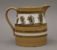 A T G Green Mocha Ware jug. 15.5 cm high.