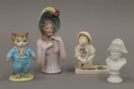 Four various porcelain figurines.