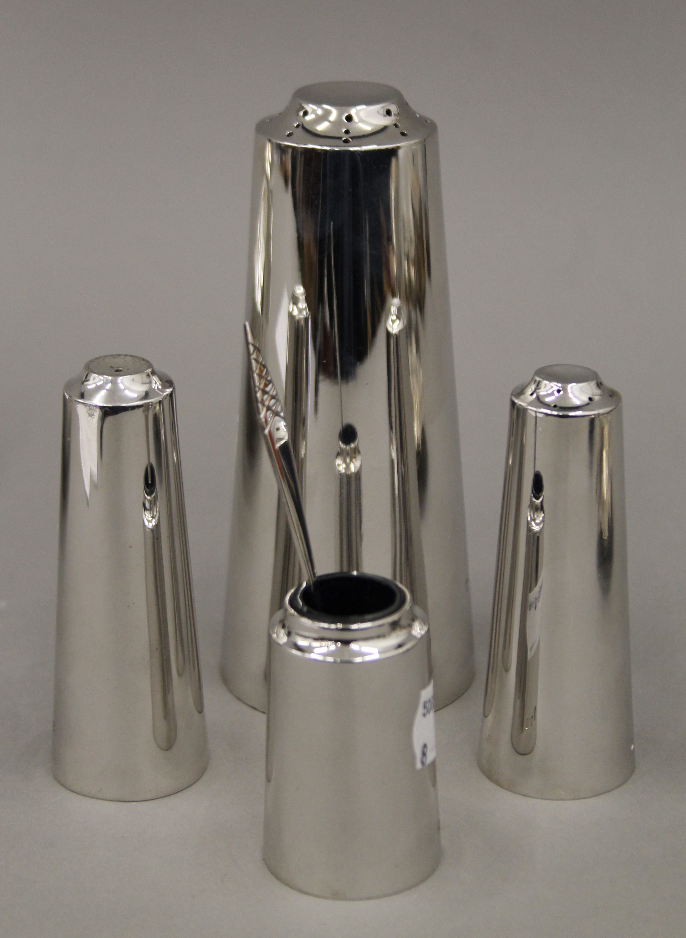 A Contemporary silver cruet set. The largest 14 cm high. 474.1 grammes.