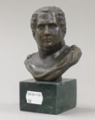 A small bronze bust of a Roman. 14 cm high.