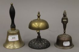 Three vintage bells. The largest 16 cm high.