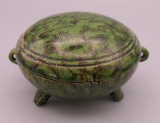 A Chinese green lidded censer. 7 cm diameter.