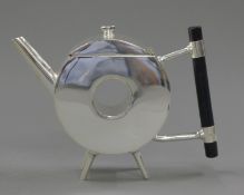 A Christopher Dresser style teapot. 14.5 cm high.