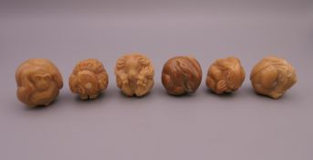 Six small animal carvings. Monkey netsuke 3 cm high.