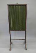 An unusual Regency mahogany screen. 46 cm wide.