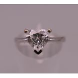 An 18 ct white gold heart shaped diamond ring, with GIA certificate, stating carat weight 1.