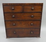 A Victorian mahogany chest of drawers. 94 cm wide.