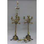 A pair of bronze Empire style candelabra lamps. 97 cm high.