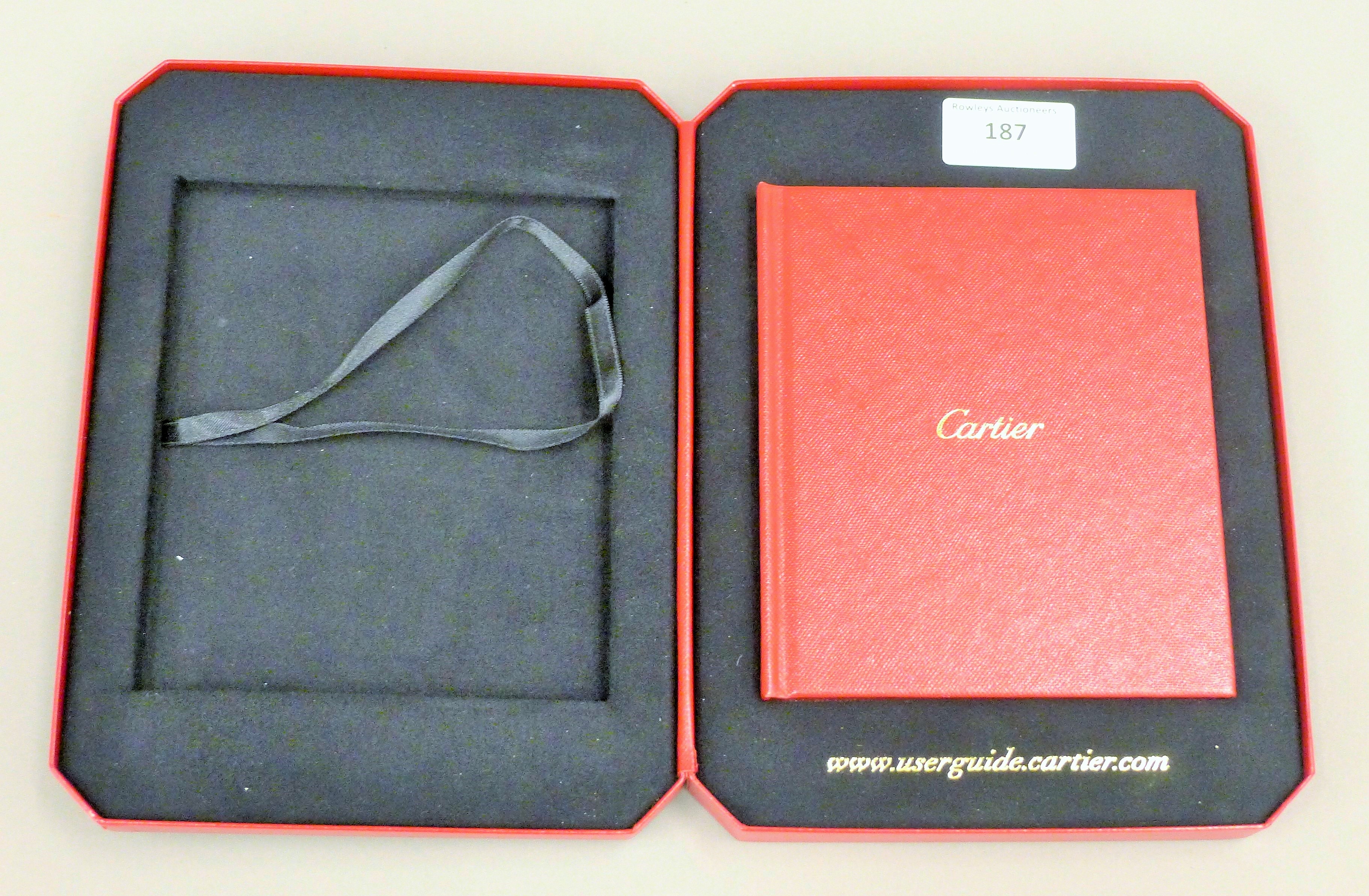 A Cartier watch user guide booklet in box. - Image 2 of 2