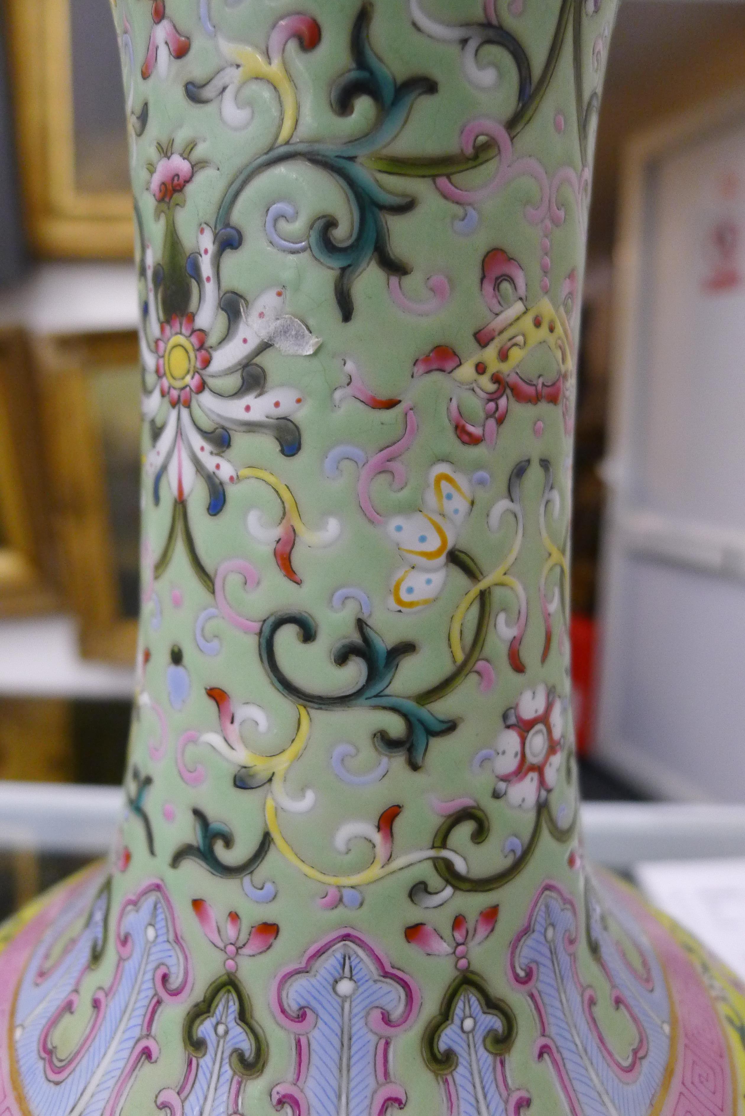 A Chinese green ground porcelain vase with scrolling foliate decoration, - Image 7 of 9