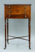 An early 19th century mahogany work table. 45 cm wide.