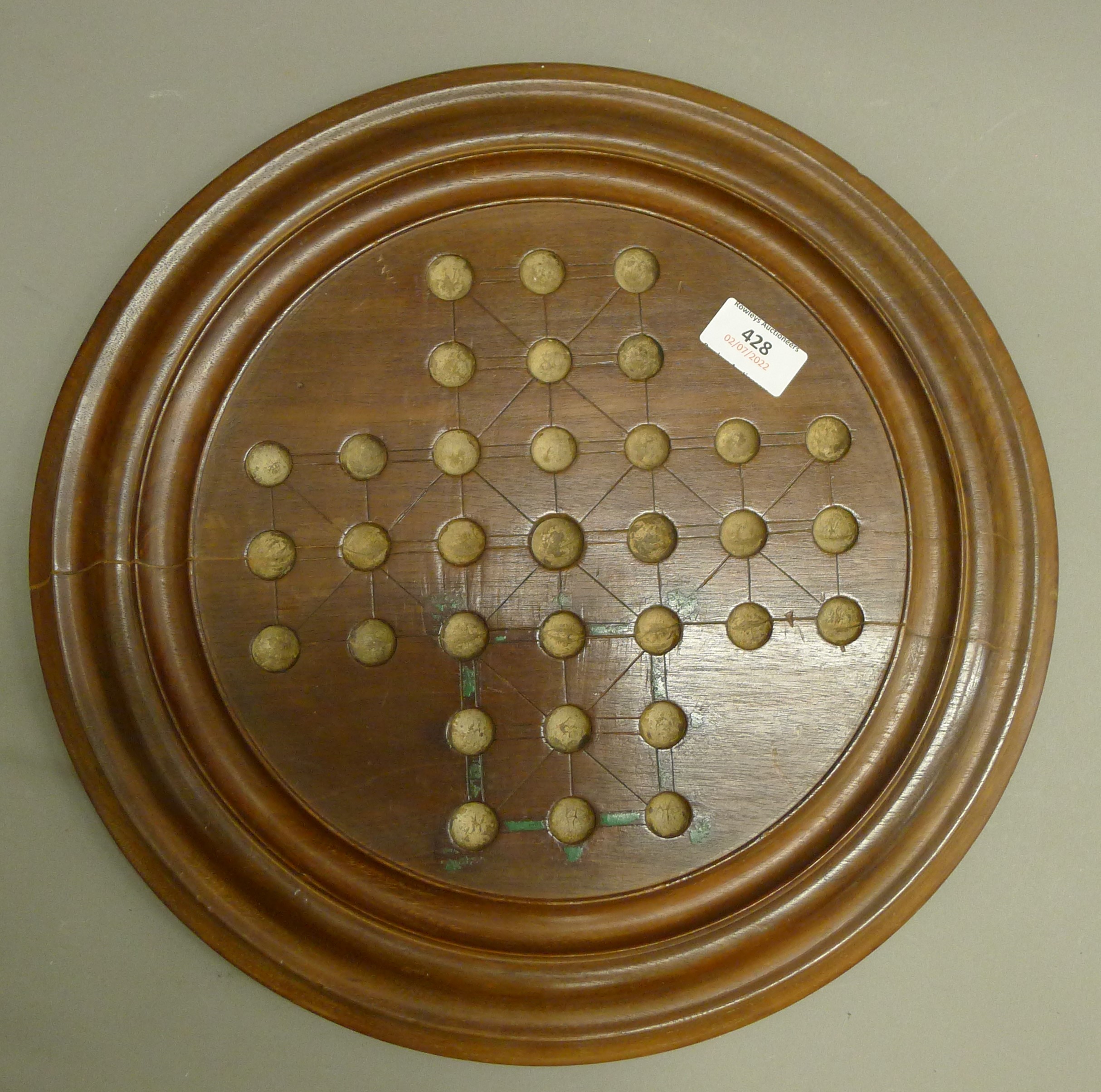 A Victorian mahogany solitaire board. 40 cm diameter. - Image 2 of 4