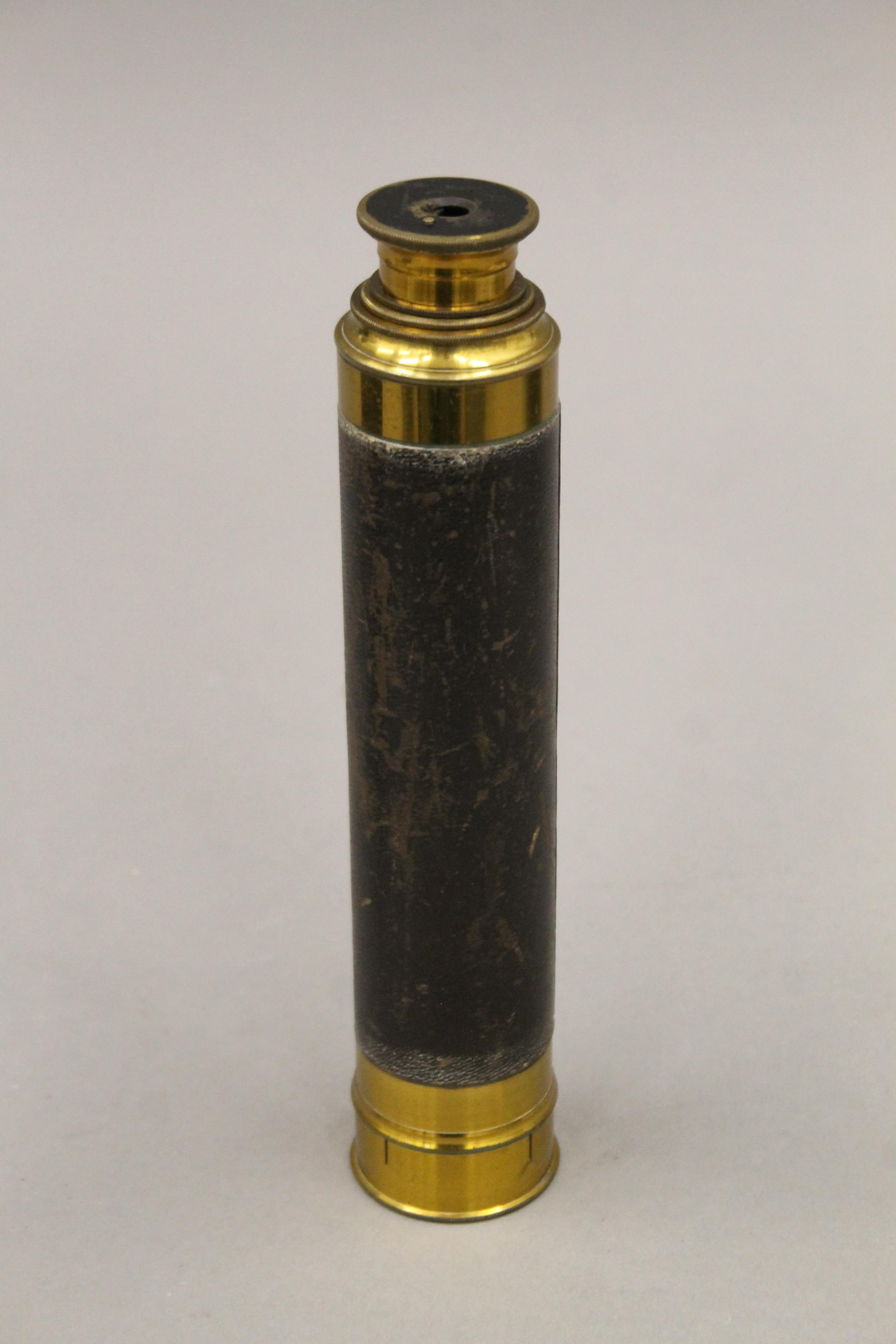 A leather cased brass telescope. 22.5 cm long closed. - Image 2 of 4