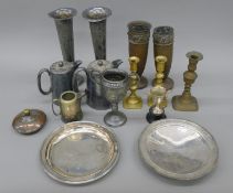 A quantity of various candlesticks, vases, etc. From the Robert Browning Settlement Collection Sale.