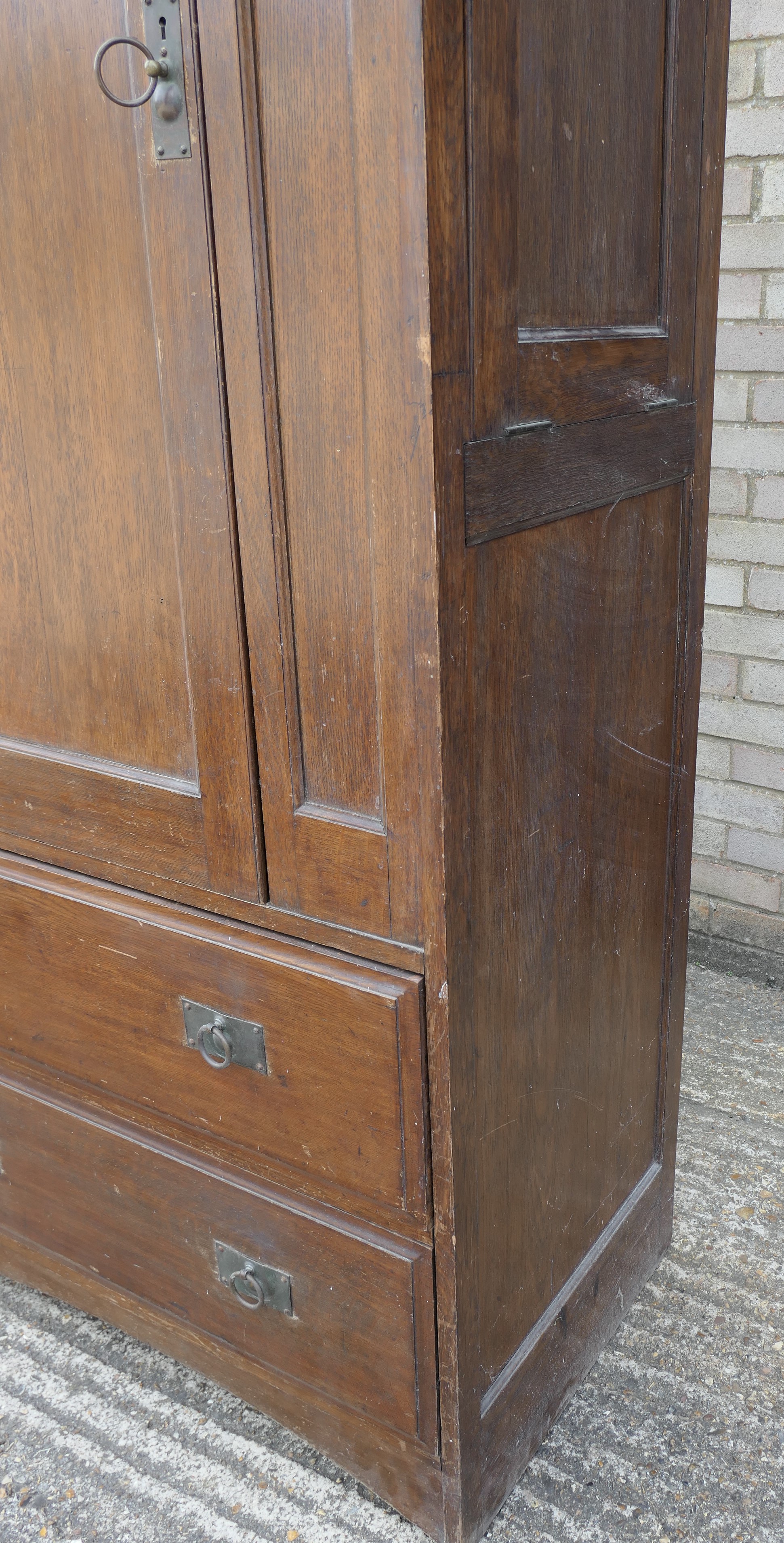 In the Manner of Heals, an Arts and Crafts oak compactum wardrobe. 199.5 cm high x 95 cm wide. - Image 9 of 11