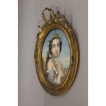 A pair of 19th century gilt framed Portraits of Ladies. Each approximately 68 cm high.