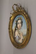 A pair of 19th century gilt framed Portraits of Ladies. Each approximately 68 cm high.