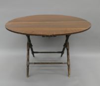 A 19th century coaching table. 101 cm wide.