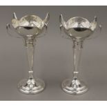 A pair of large silver bud vases. 24 cm high. 693 grammes weighted.