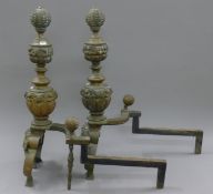 A pair of large 19th century andirons. 69 cm high.