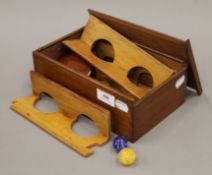 A marbles shooting games mahogany box, circa 1900.