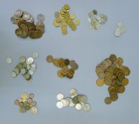 A coin collection, including some silver coins.