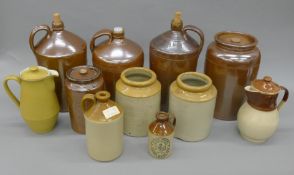 A collection of various stoneware crocks, flagons, etc.