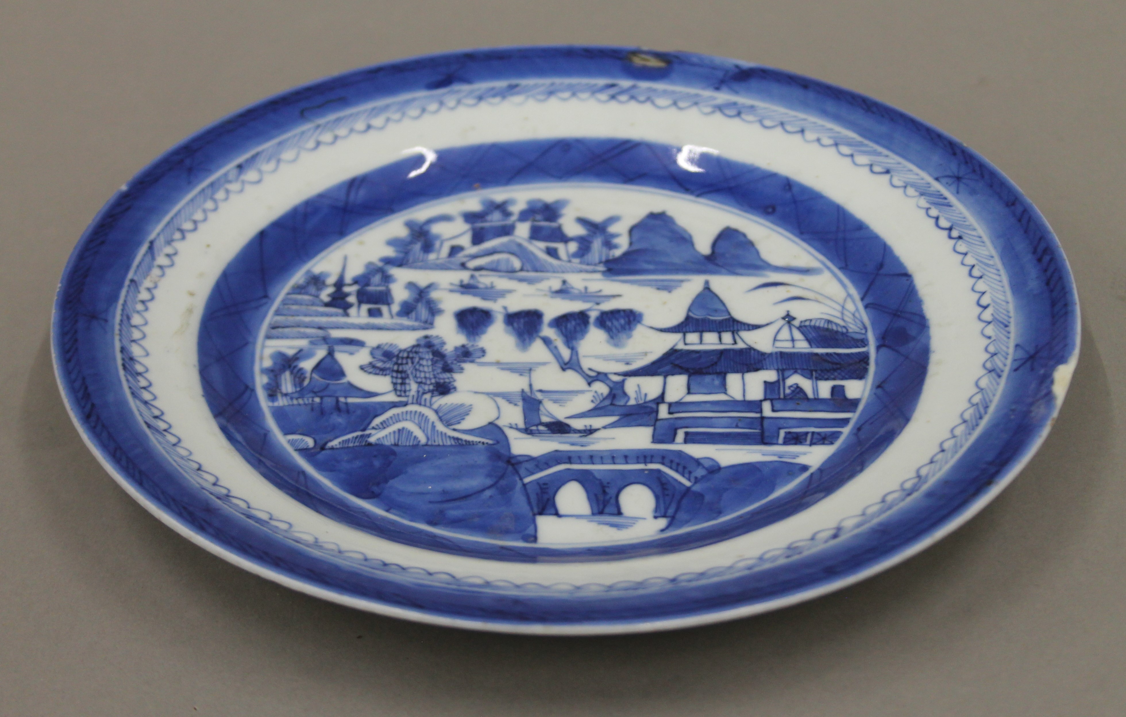 Four 18th century Chinese blue and white porcelain plates. Each approximately 21.5 cm diameter. - Image 2 of 4