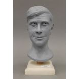 A bust of a gentleman, the reverse impressed Andy Woodhead. 27.5 cm high overall.