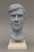 A bust of a gentleman, the reverse impressed Andy Woodhead. 27.5 cm high overall.