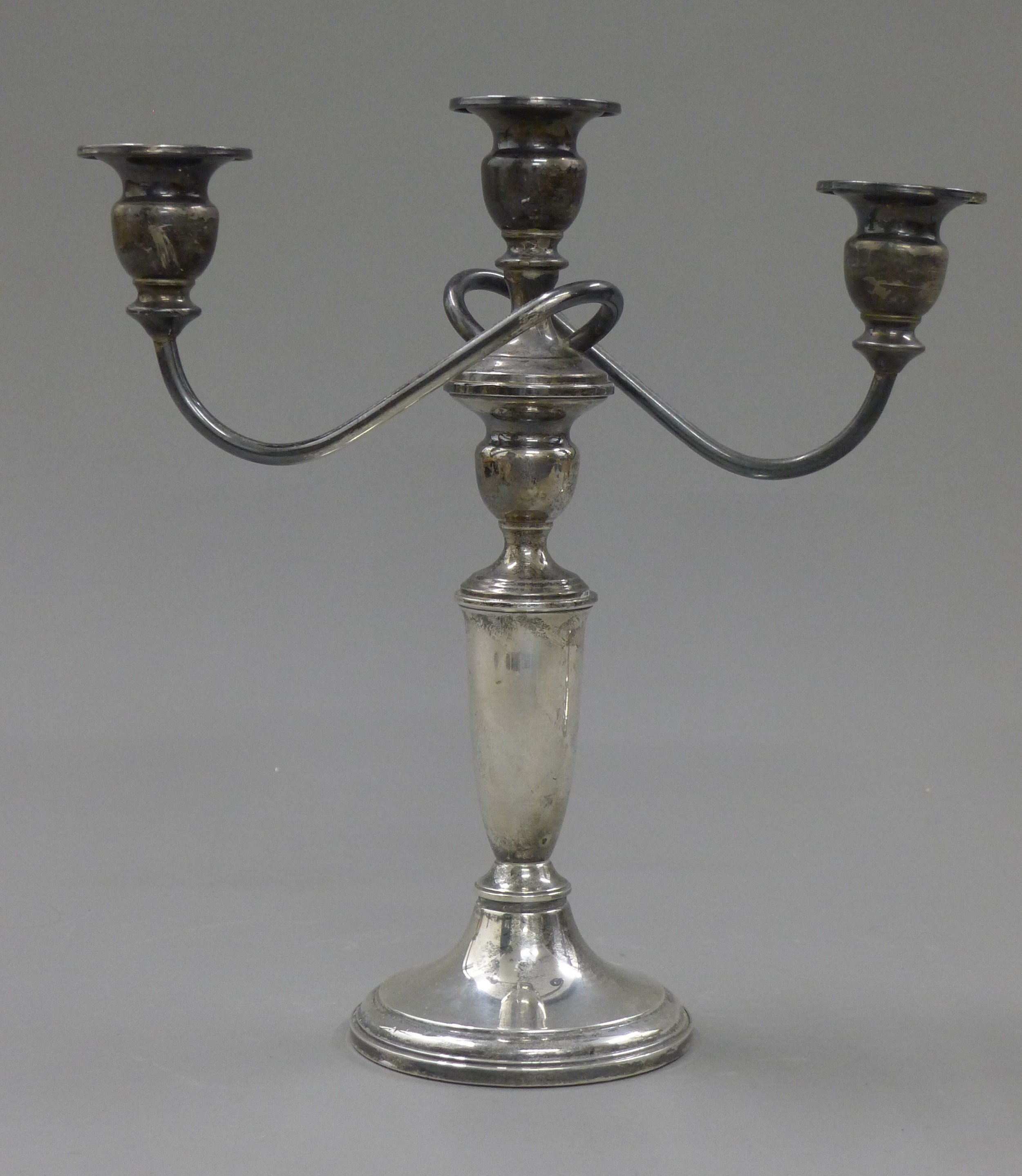 A pair of sterling silver three branch candelabra. 27 cm high. - Image 2 of 2