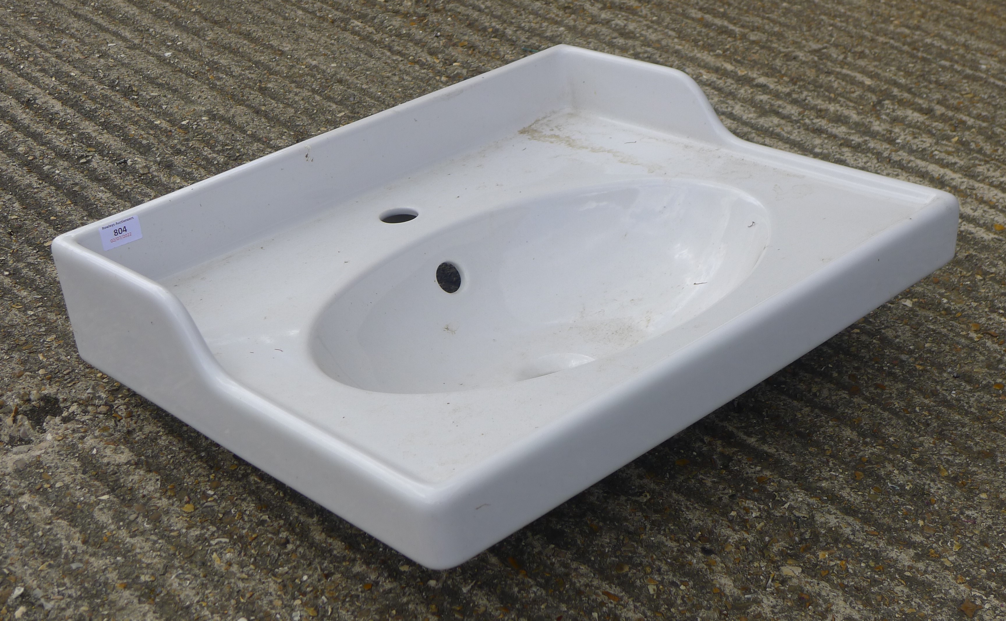 A modern porcelain bathroom sink. - Image 3 of 3