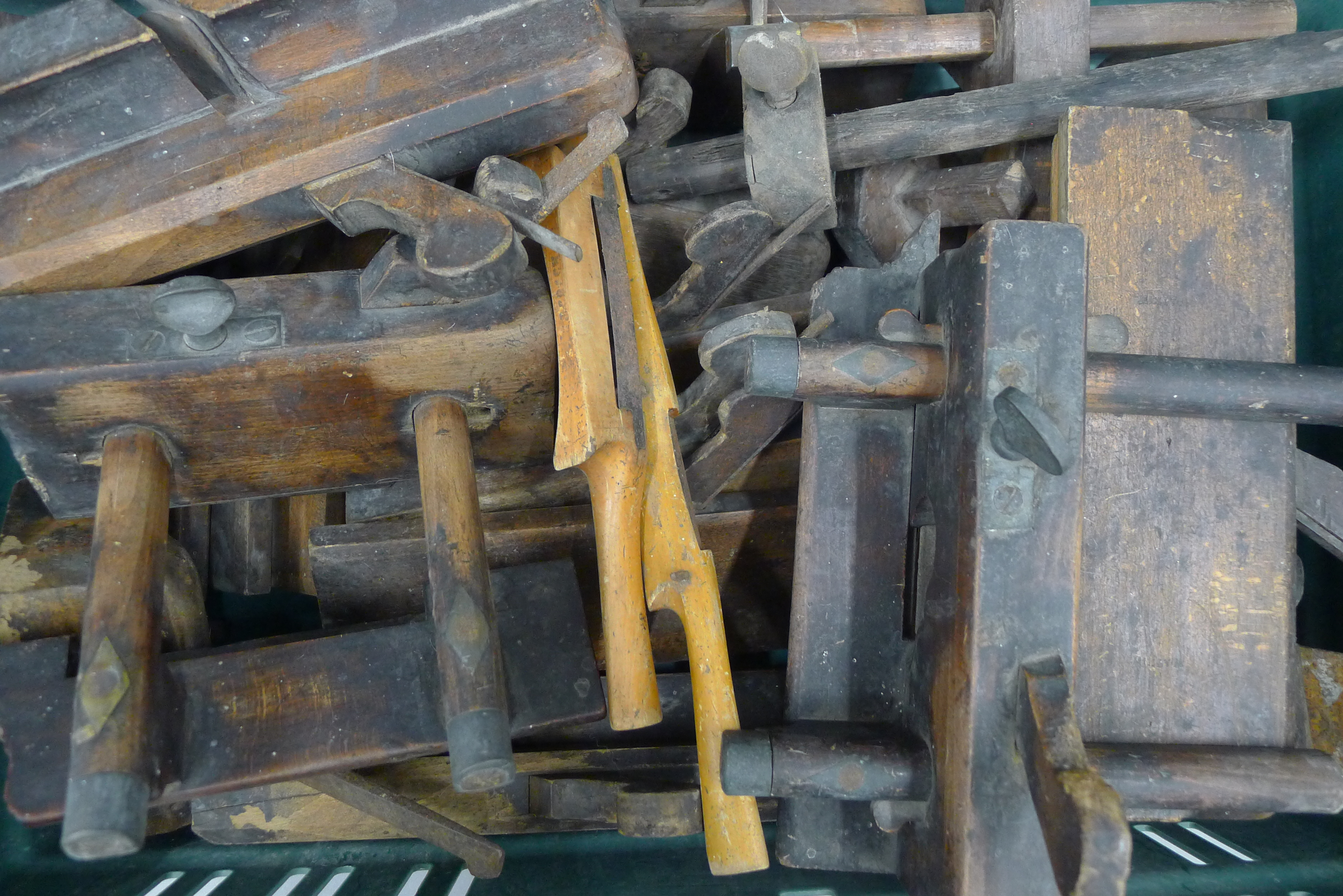 A quantity of wood working planes.