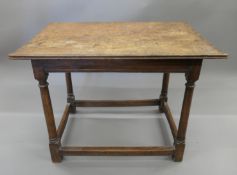 An 18th century burr elm topped centre table. 86 cm long.