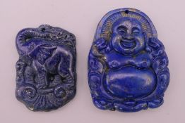 Two lapiz pendants, one depicting a Buddha, the other an elephant.