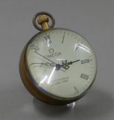 A small ball clock. 7.5 cm high.