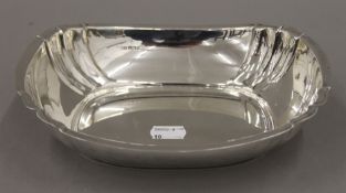 A silver centre bowl. 22 cm long. 328.4 grammes.